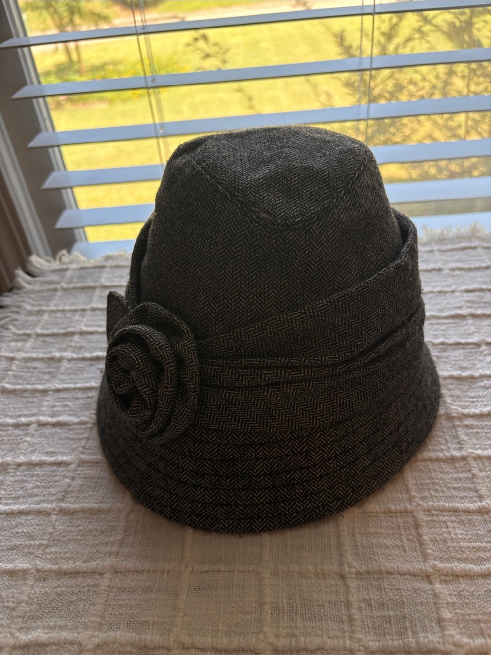 Tweed British hat is great gray tweed goes well with dresses, coats and jeans.